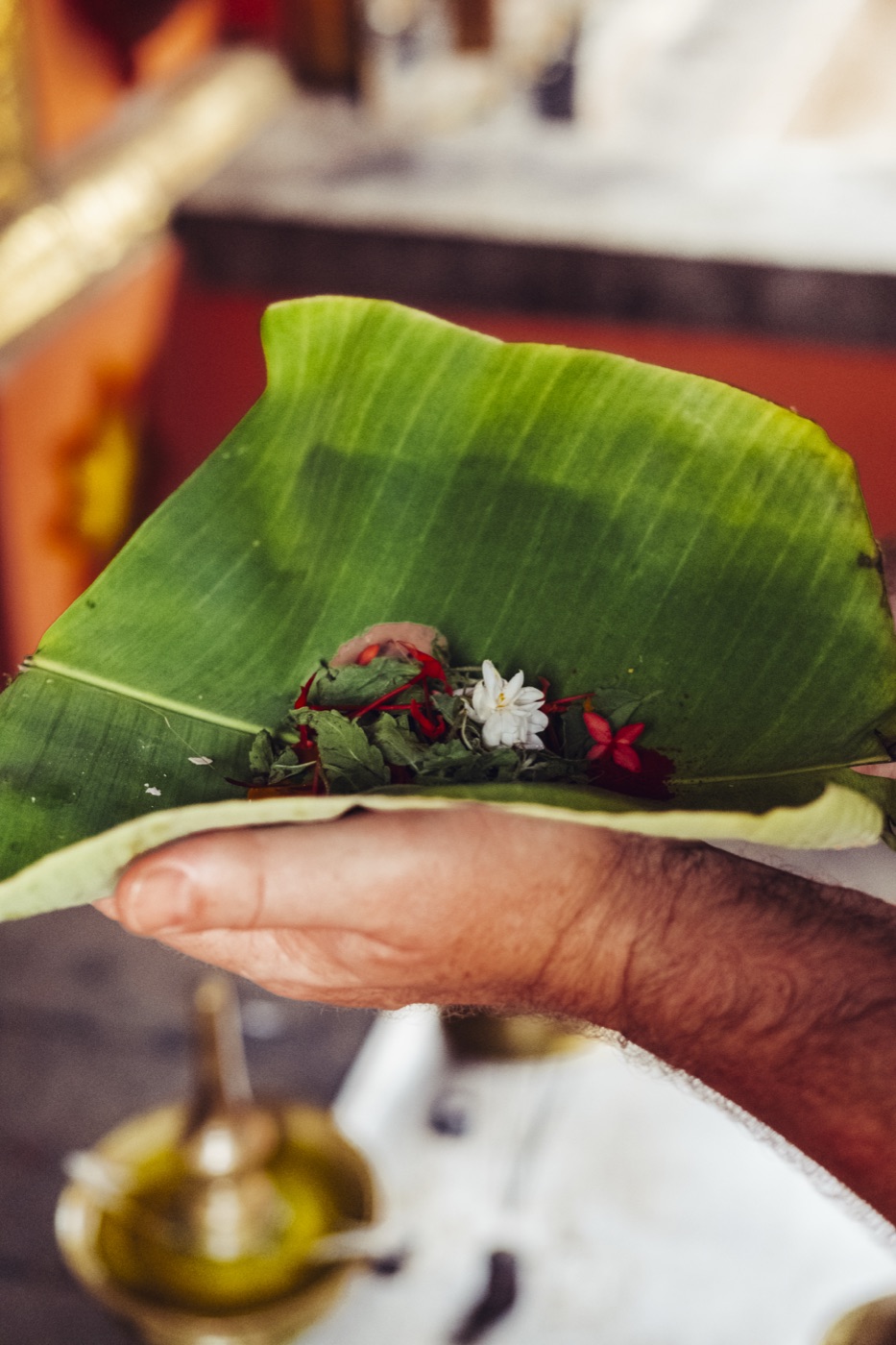 A banana-leaf offering of flowers